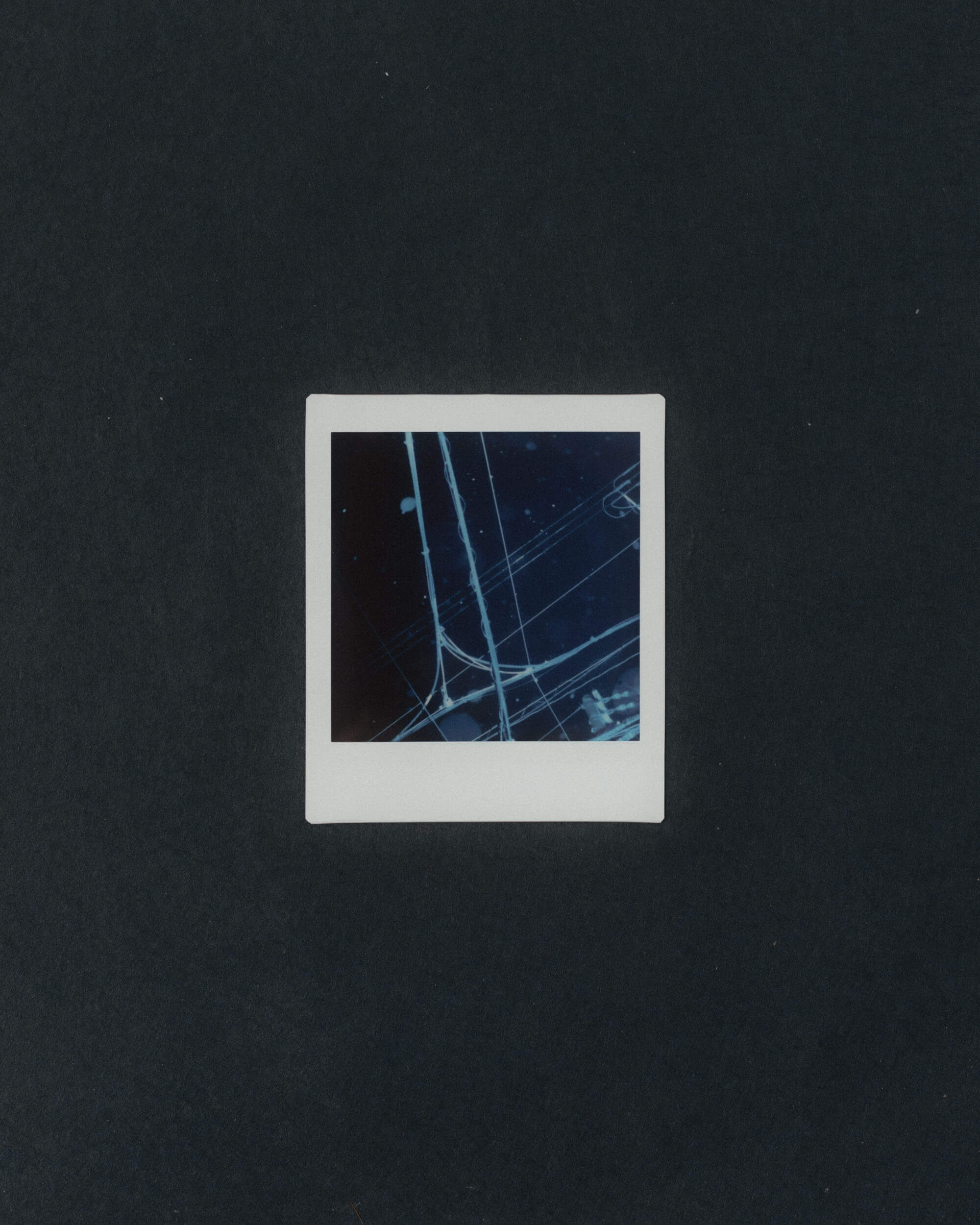 Instax of powerlines in Hiroshima, Japan.