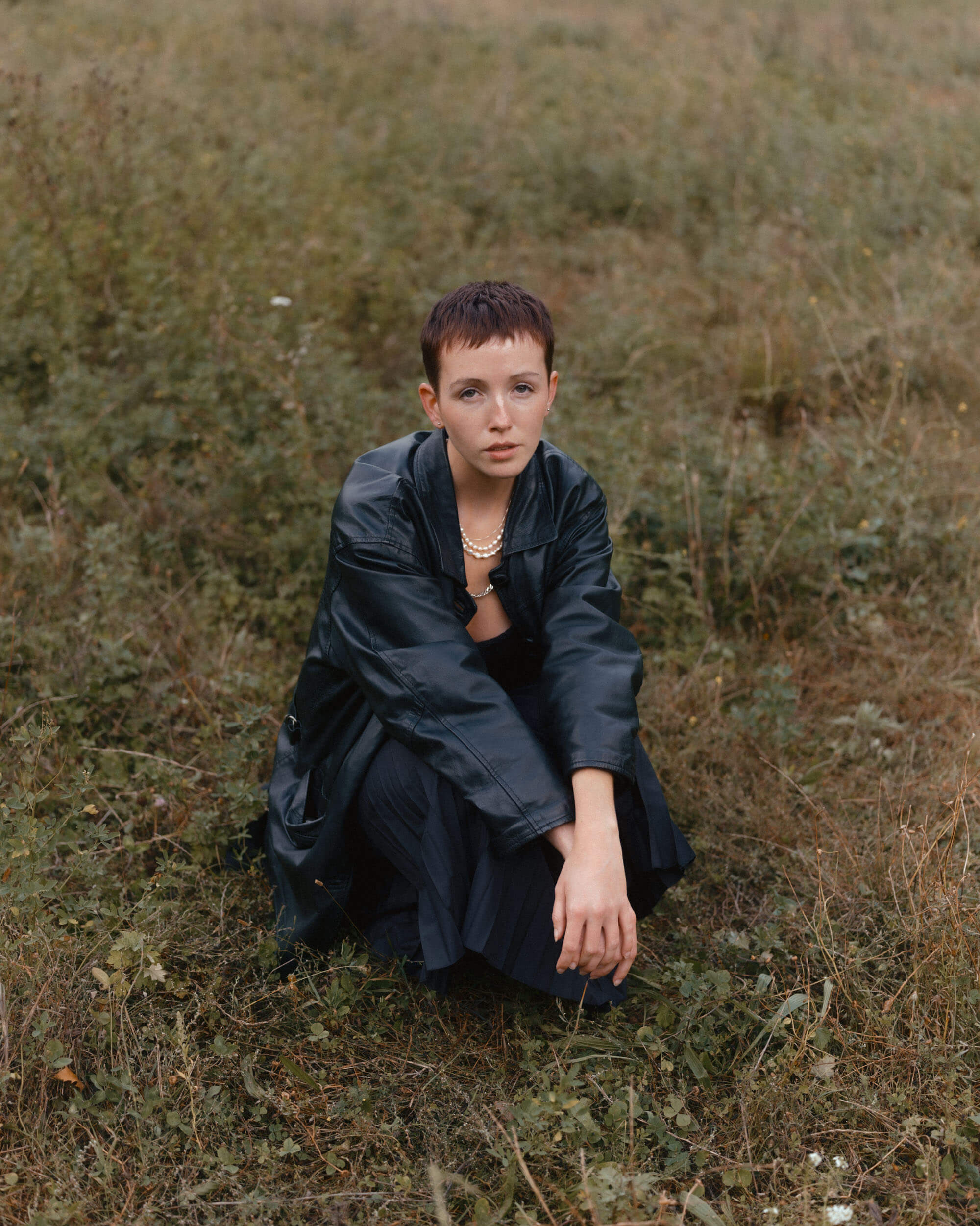 Charley crouching in London Fields