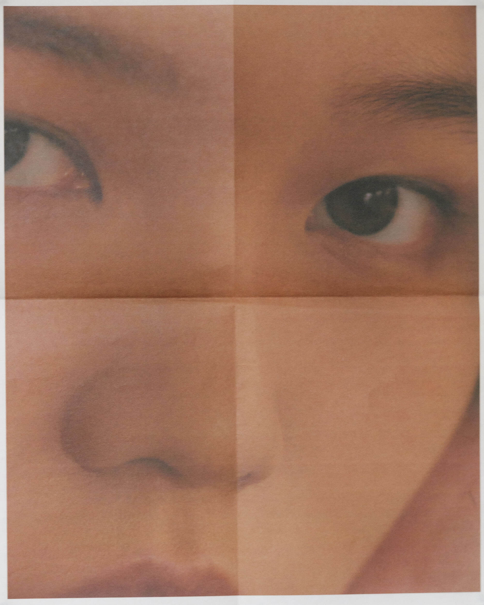 Creased newspaper print of Yoshito